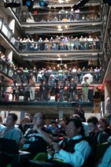 Zynga employees watch a press conference from the atrium at Zynga's HQ. Photo by Liz Hafalia/The Chronicle 2011